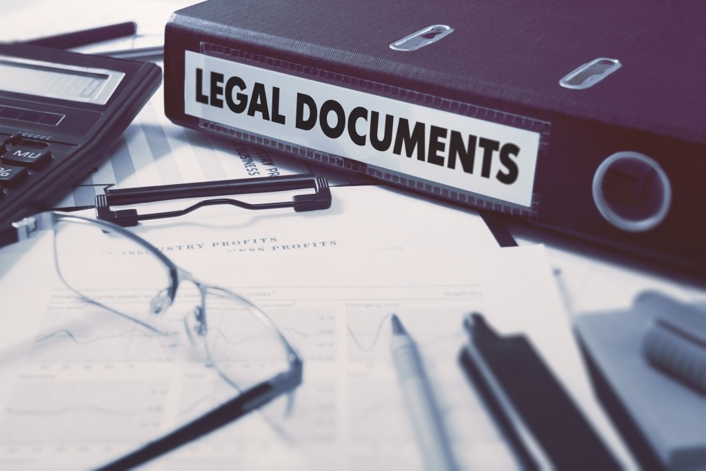 Legal Documents on Ring Binder. Blured, Toned Image.